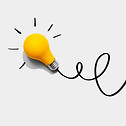 Brainstorming concept with a yellow light bulb - Flat lay.jpg
