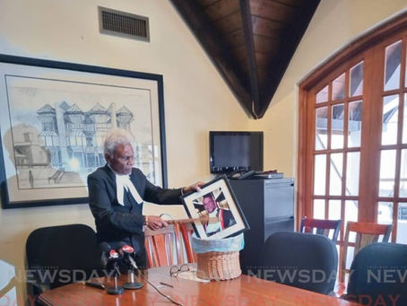 Israel Khan 'destroys' CJ Archie's framed photo