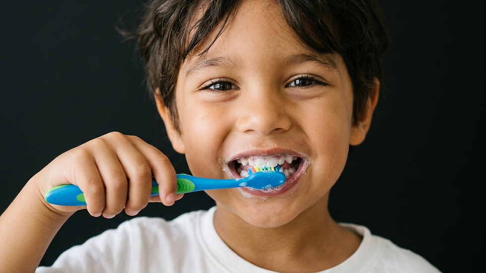 Close-up view of a child brushing teeth with a colorful toothbrush