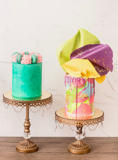 Buttercream cakes featuring watercolor design, chocolate sails and macarons