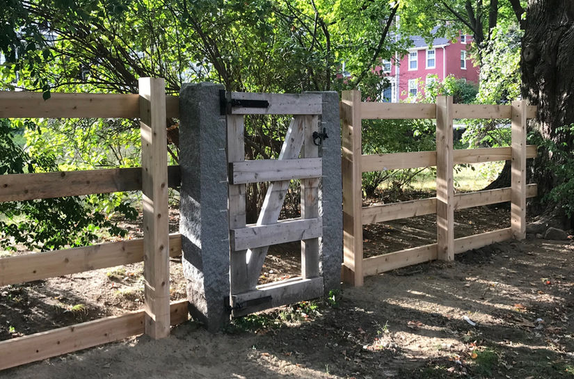 Reclaimed granite posts with cedar
