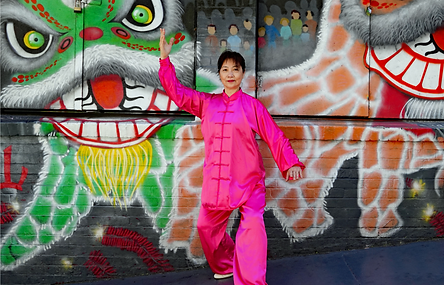 Tai chi master in pink outfit