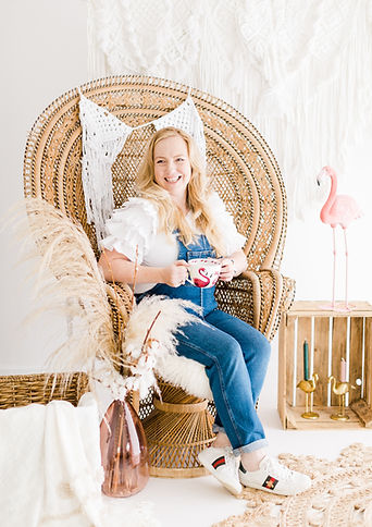 owner Brand Photo with Peacock chair