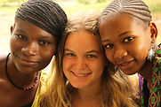 three volunteers at Montessori Kindergarten