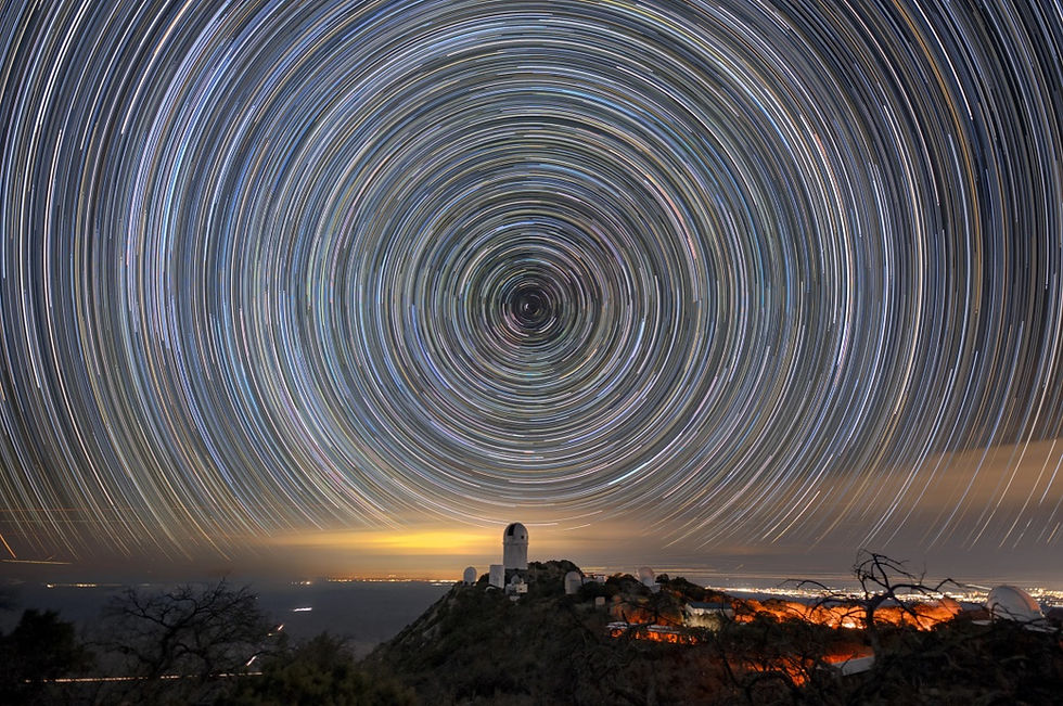 Star trails over the Mayall Telescope that houses DESI. Credit: Luke Tyas/Berkeley Lab and KPNO/NOIRLab/NSF/AURA