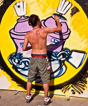 The graffiti artist Umit Turgay Durgun doing graffitti in the streets of Istanbul Turkey