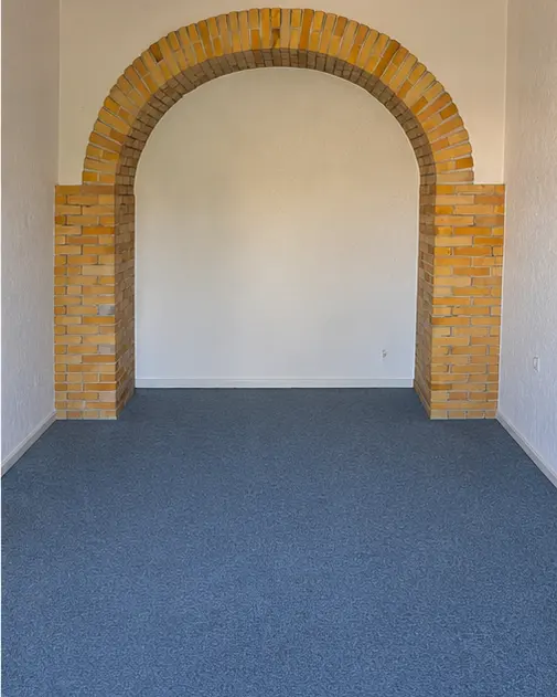 Wohnzimmer nach der Entrümpelung, komplett leer geräumt