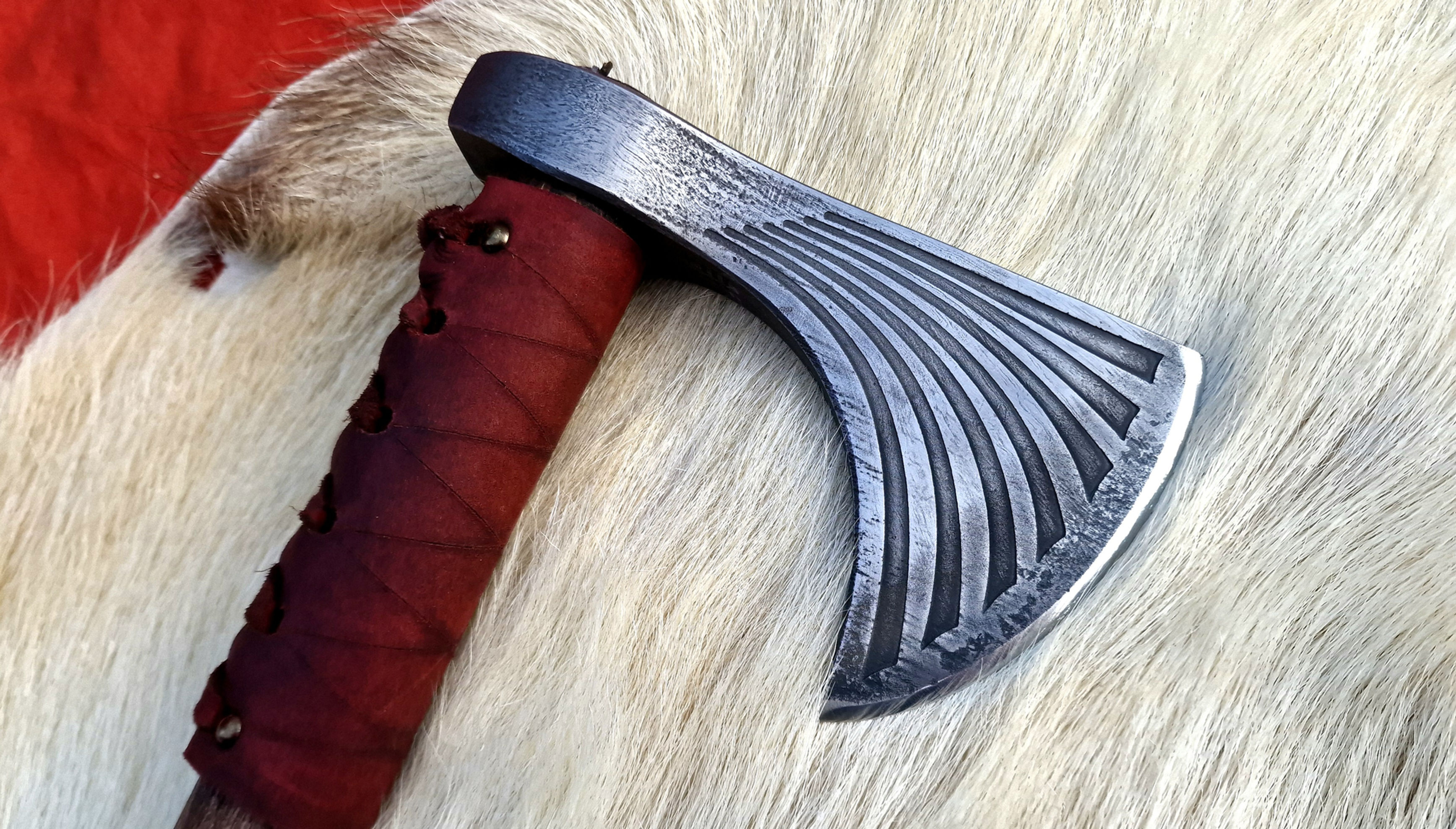 Tomahawk with engraved head