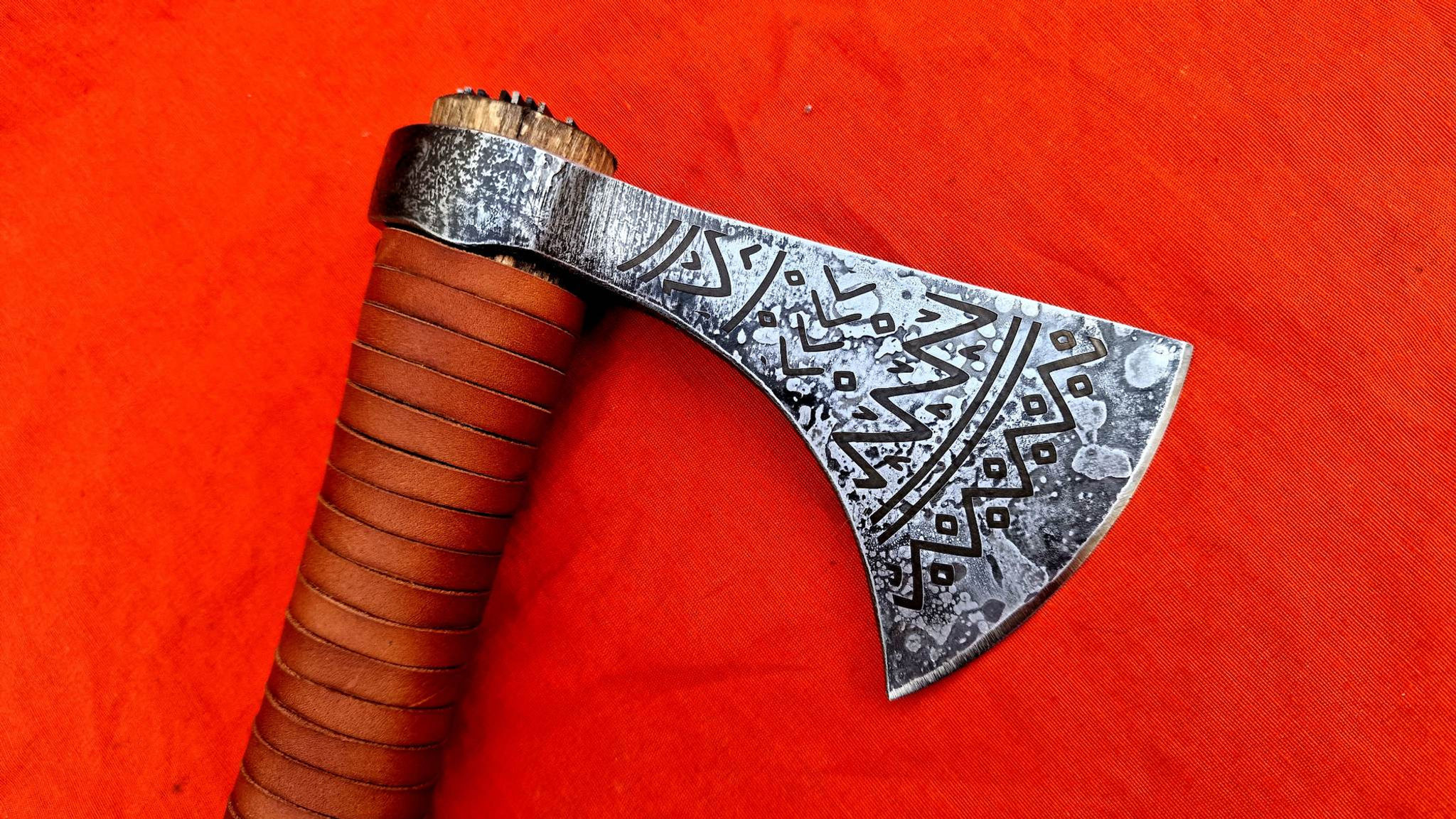 Tomahawk with engraved head