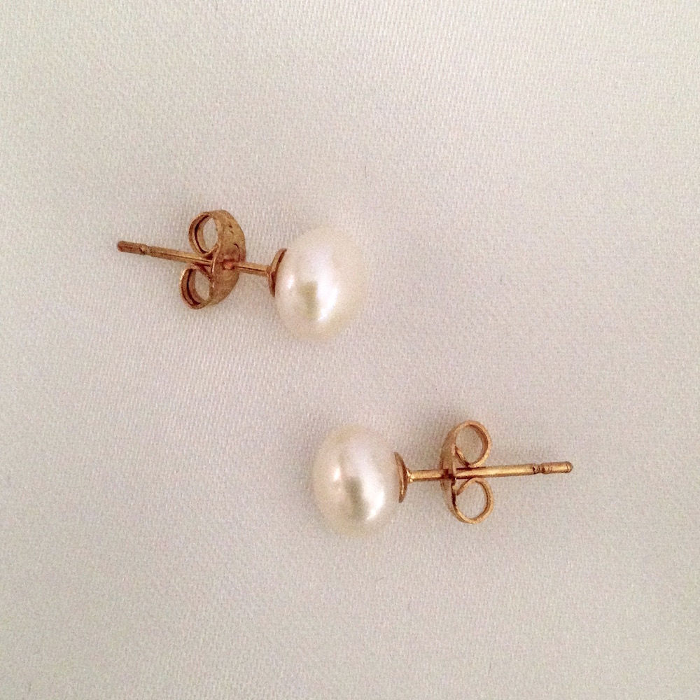 White freshwater pearl studs on gold plated posts, 7mm