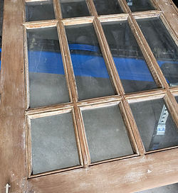 sanding and stripping the door