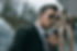 serious-handsome-security-guard-talking-by-portabl-3UTDT27.jpg