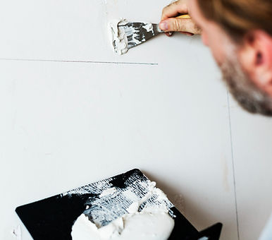 construction-worker-painting-wall-1.jpg