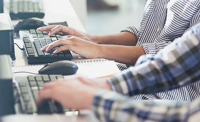 Students Typing at Their Computers