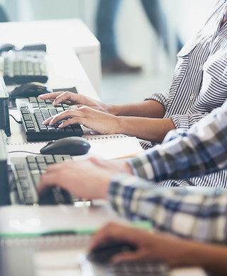 Students Typing at Their Computers