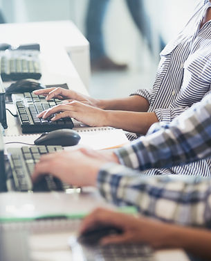 Students Typing at Their Computers