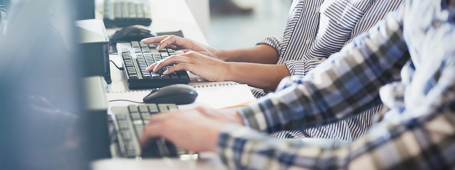 Students Typing at Their Computers