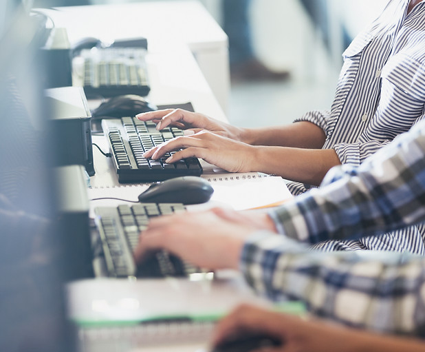 Students Typing at Their Computers