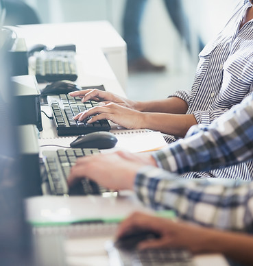 Students Typing at Their Computers