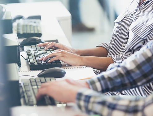 Students Typing at Their Computers
