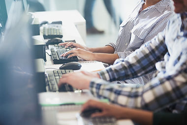 Students Typing at Their Computers