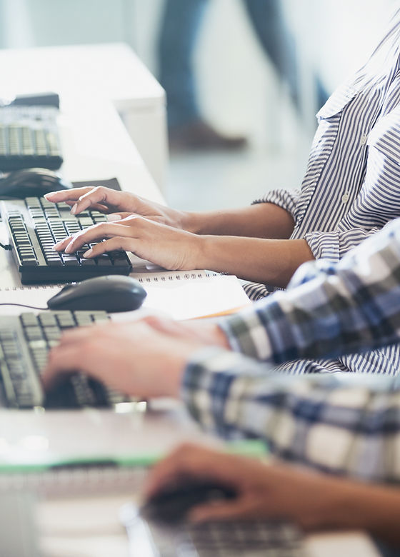 Students Typing at Their Computers