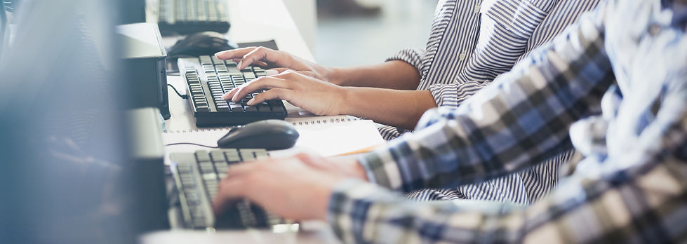 Students Typing at Their Computers