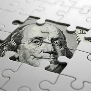 Jigsaw puzzle with piece missing, with dollar bill illustration, highlighting themes of currency, finance and funding gap