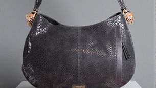 Black leather shoulder bag with tiger details on side
