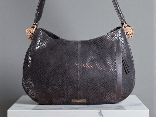 Black leather shoulder bag with tiger details on side