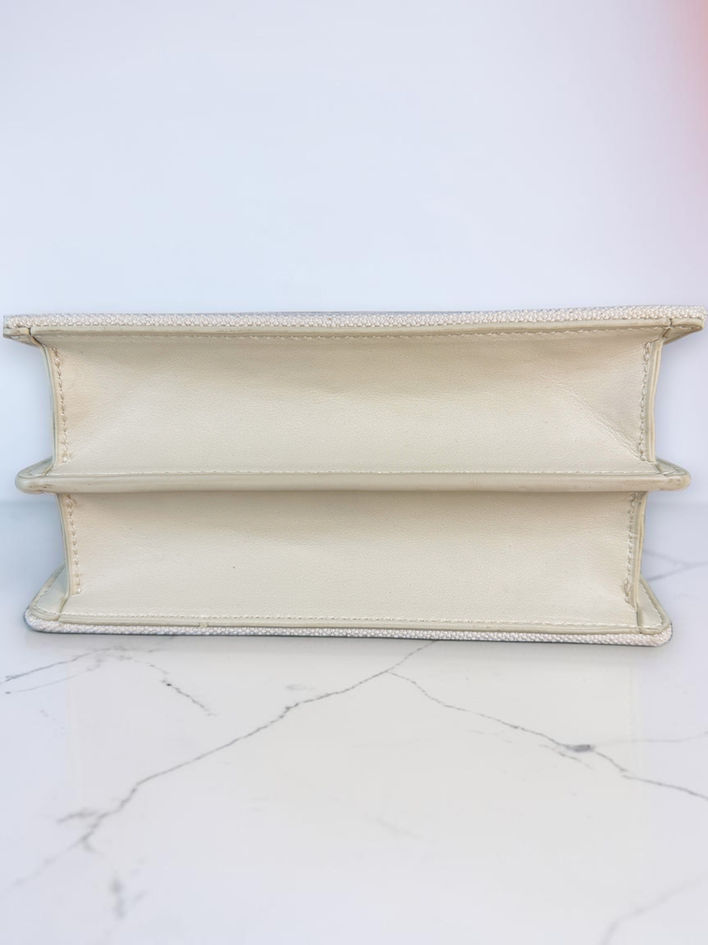 Betsey Johnson Teddy Bear Bag bottom with cream faux leather panels.