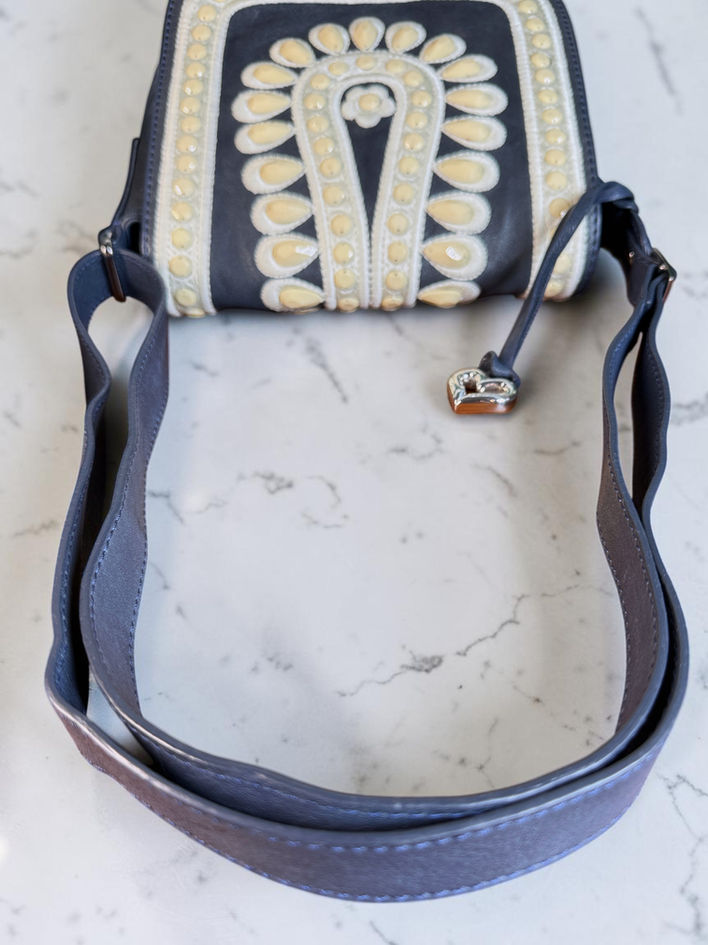 Brighton Crown Jewel navy leather bag with adjustable shoulder or crossbody strap extended and original Brighton heart charm