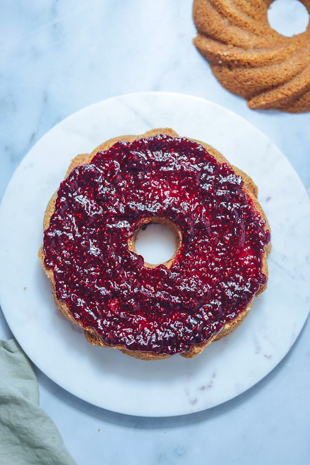 assembled Victoria Bundt Cake with strassembled Victoria Bundt Cake with strawberry cream fillingawberry cream filling