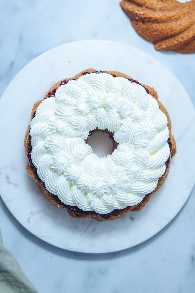 Sliced Victoria Bundt Cake ready to be filled with cream