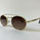 Miniatura: Óculos de sol oval dourado lente marrom escura