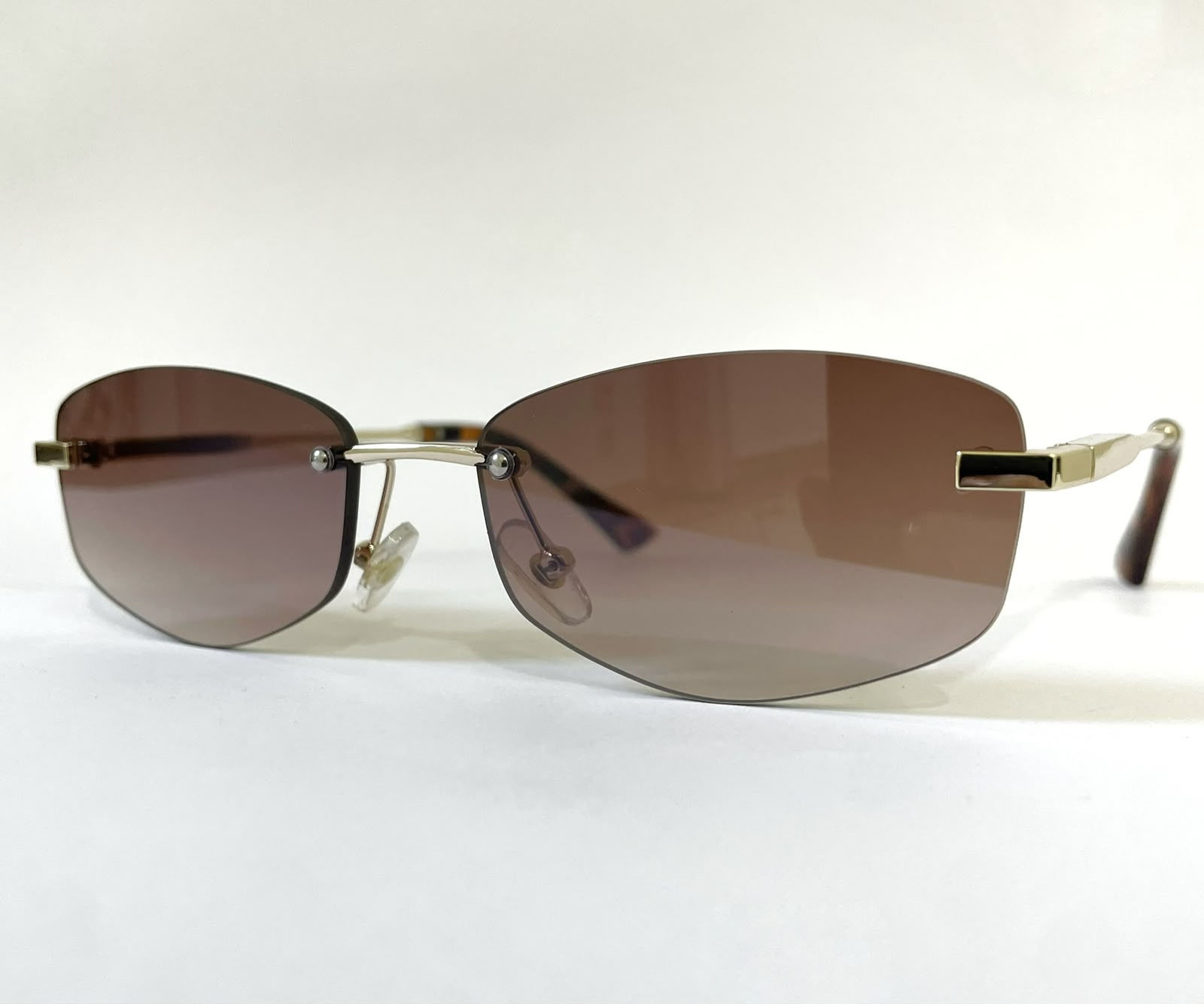 Óculos de sol metal lente infinita dourado e marrom 6015