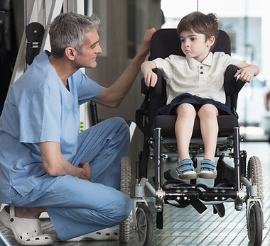 Doctor Talking to Boy in Wheelchair_edited.jpg