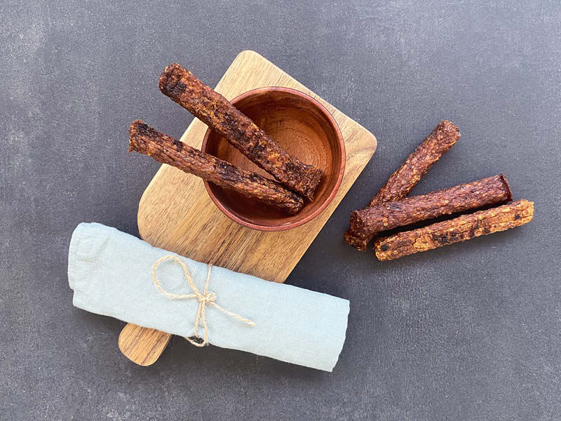 Martin Rütter Riegel Rind auf Holzbrett