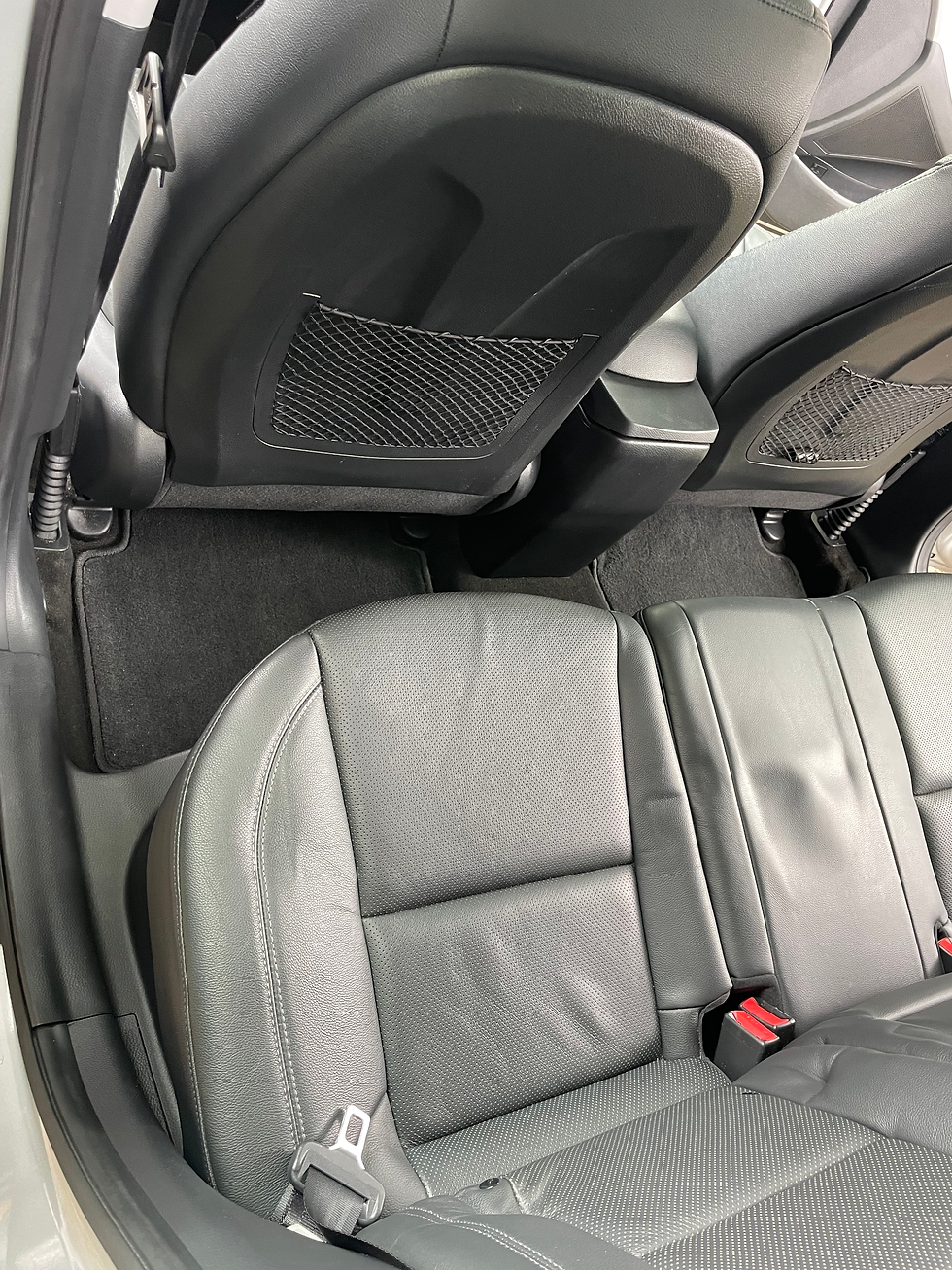 Close-up view of car interior dashboard and seats