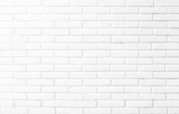 Kitchen wallpaper concept_ Close up modern white brick tiles wall texture background.jpg