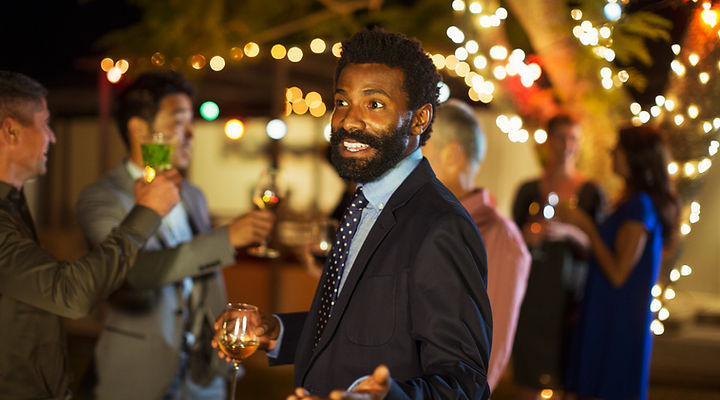 black man at a gathering