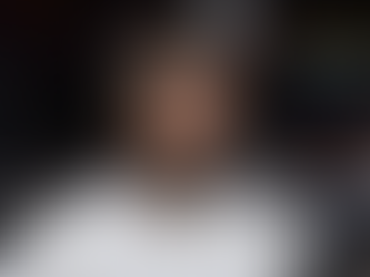 David Beckham showing fuller hair after rumored hair transplant, looking confident in public appearance.