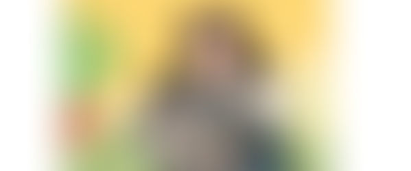 A cat trying to fit into a collar, a cat owner getting a photo of a cat, a cat not enjoying bulging out of collar, a cat looking for a new owner.