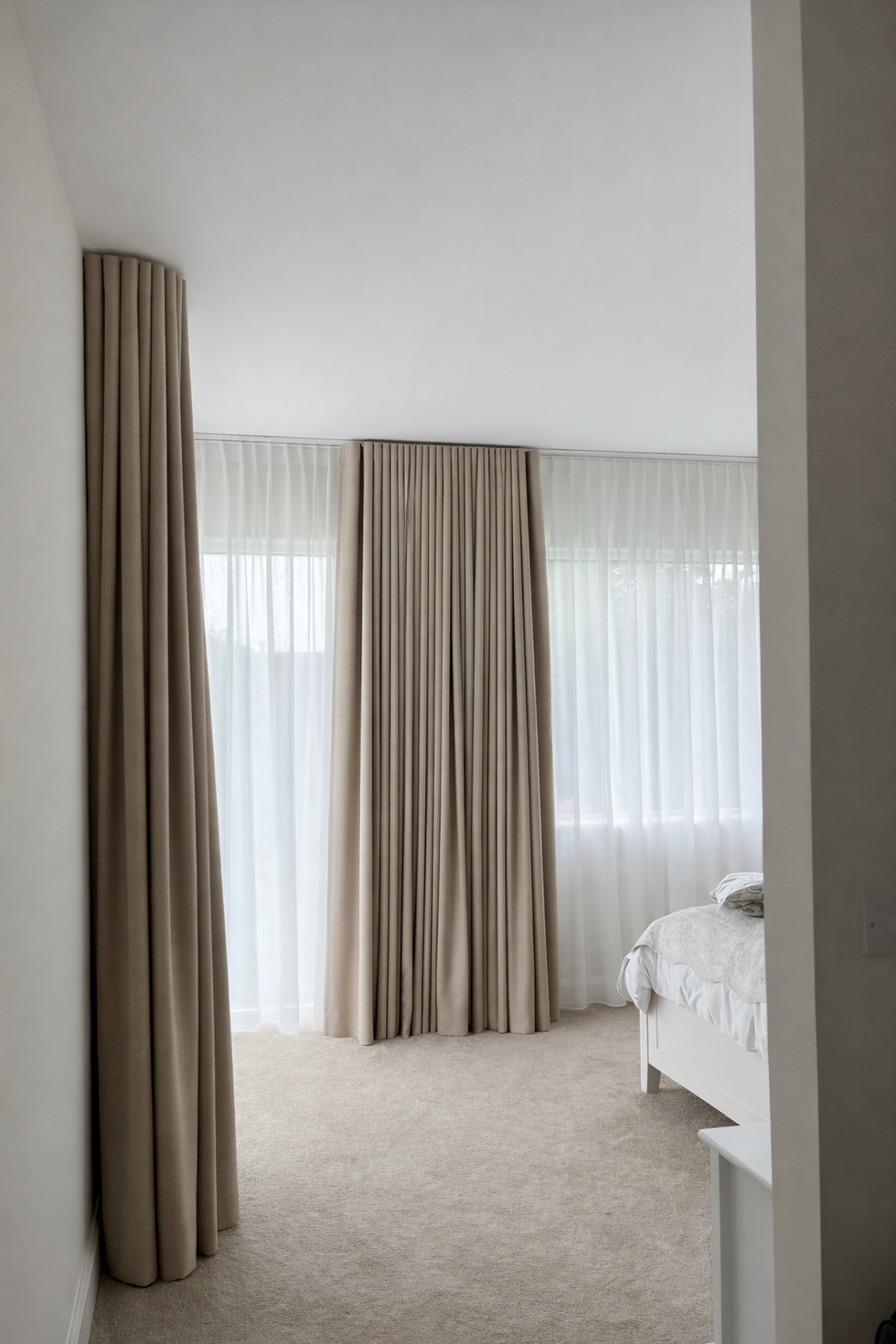 Heavy blackout-lined curtains combined with lightweight batiste sheers