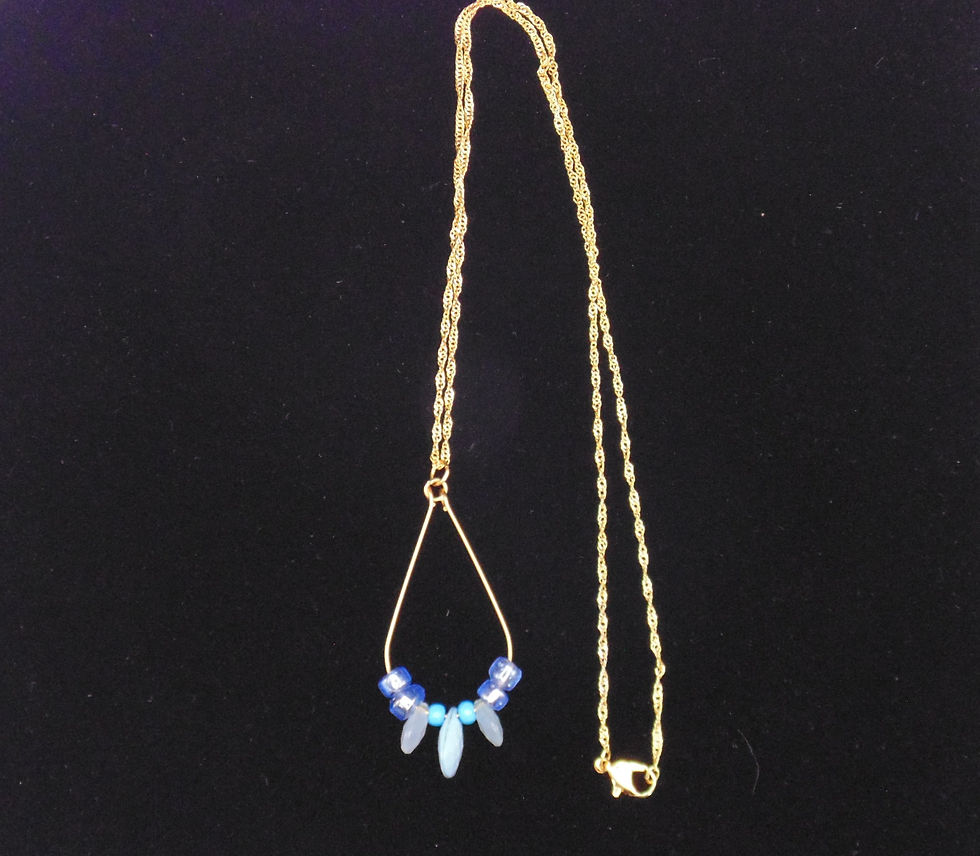 Thumbnail: Gold chain necklace with teardrop pendant featuring blue and gray beads.