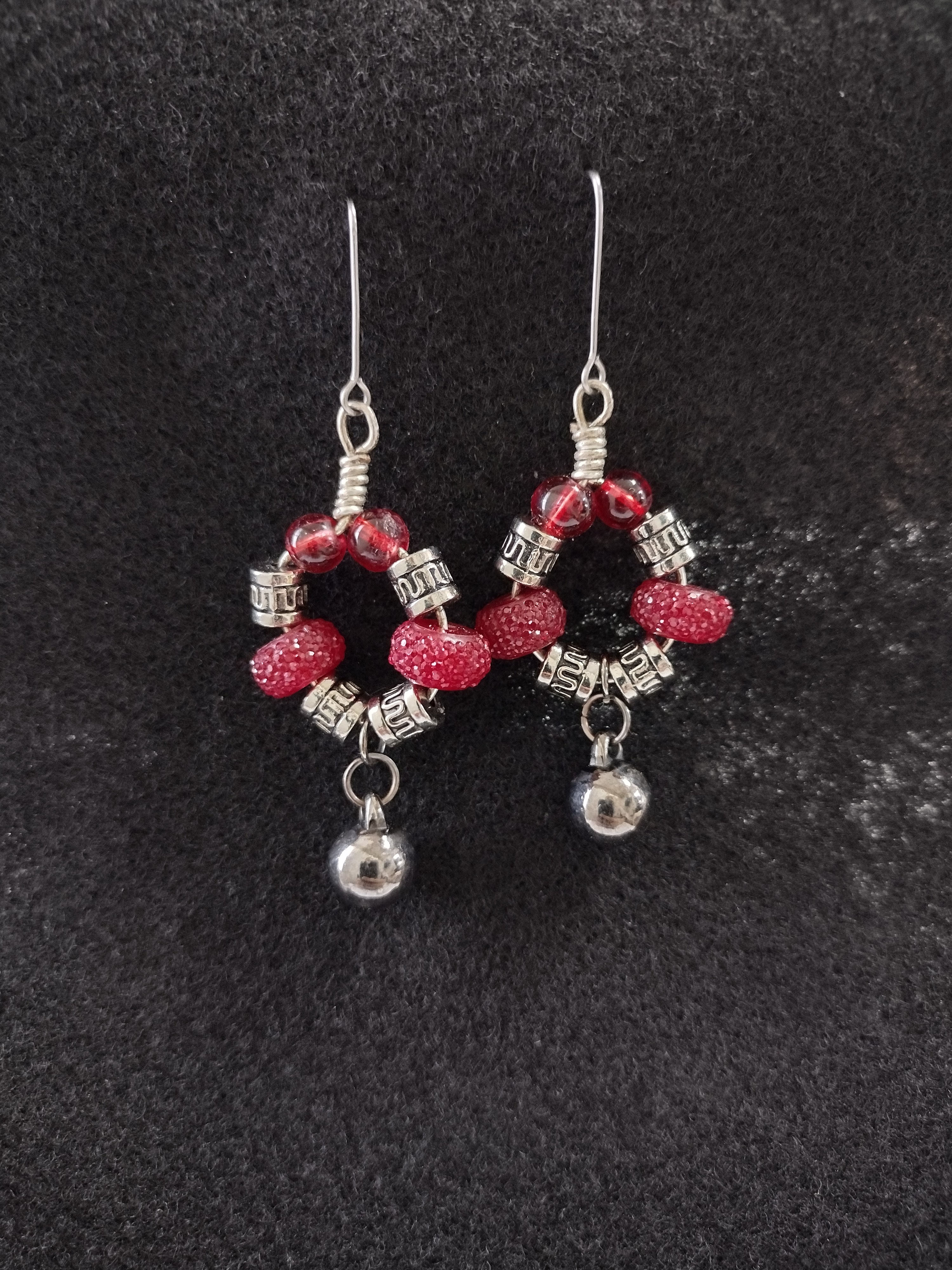 Red and silver beaded earrings with small bells