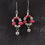 Thumbnail: Red and silver beaded earrings with small bells