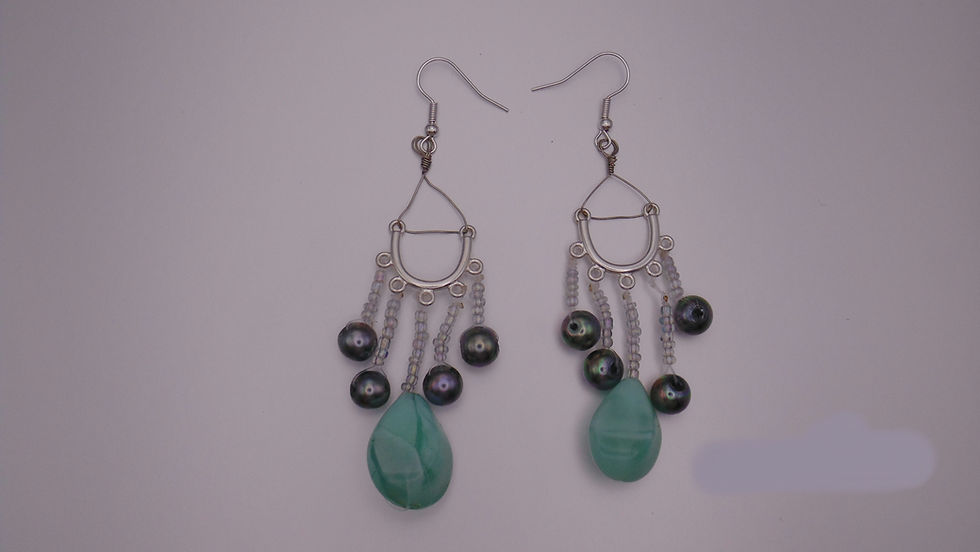 Elegant dangle earrings with pearls and green stones