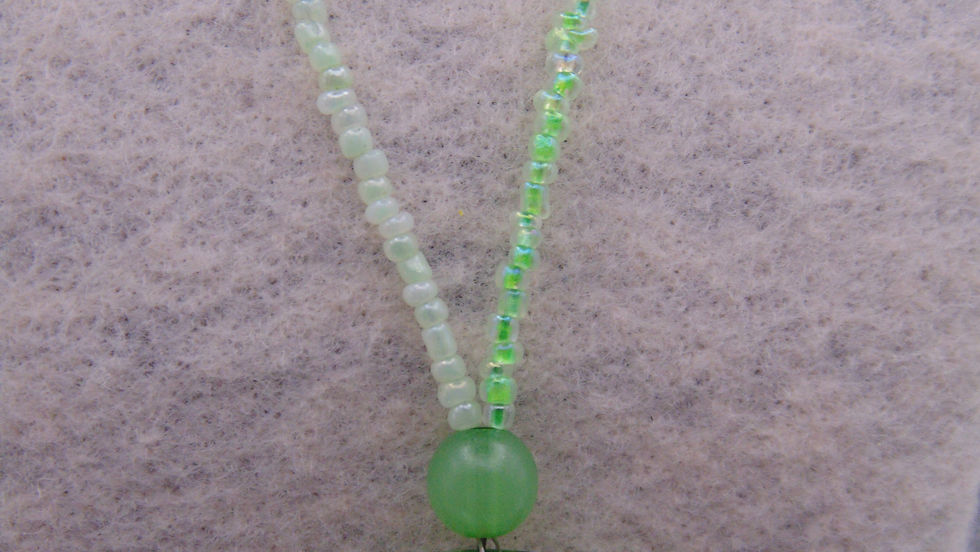 Thumbnail: Green beaded necklace with light and dark accents
