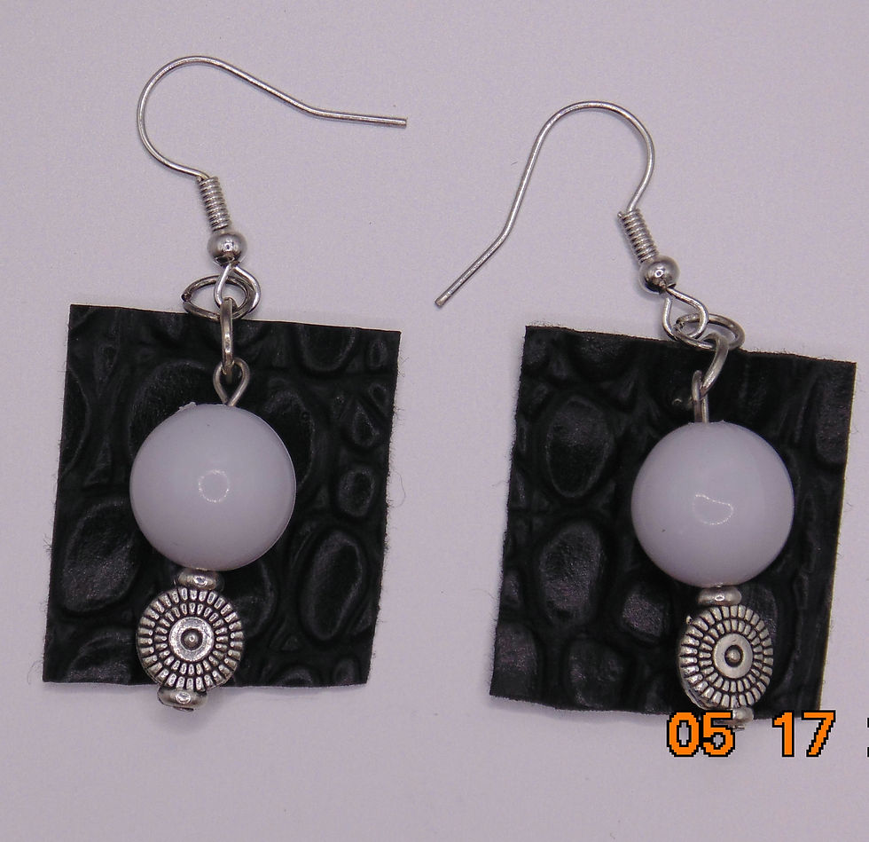 Thumbnail: Black leather and white bead earrings